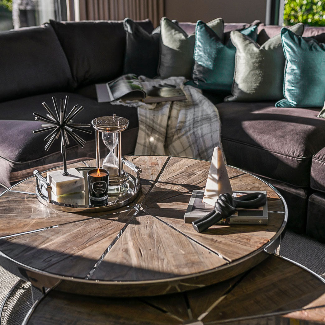 TAYLOR Nest of two reclaimed elm coffee tables with sunburst design tops and polished steel frames, perfect for modern living spaces.