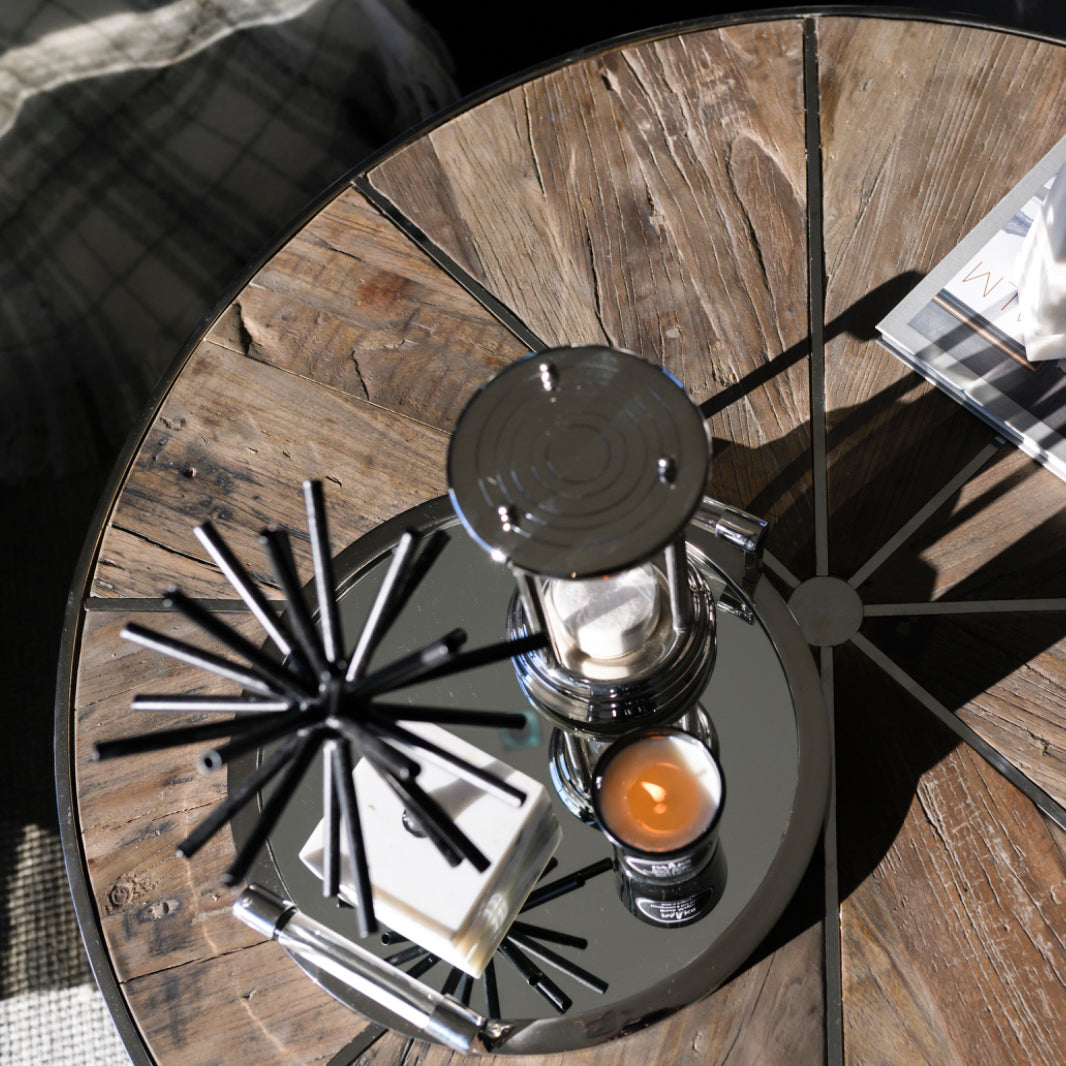 TAYLOR Nest of two reclaimed elm coffee tables with sunburst design tops and polished steel frames, perfect for modern living spaces.