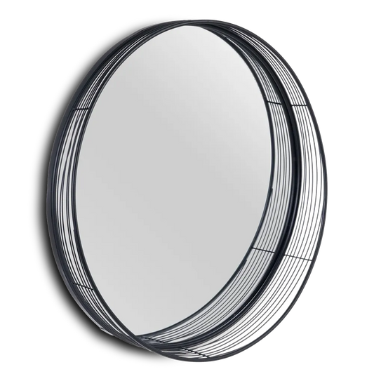 Paula black metal circular mirror in a modern decor setting