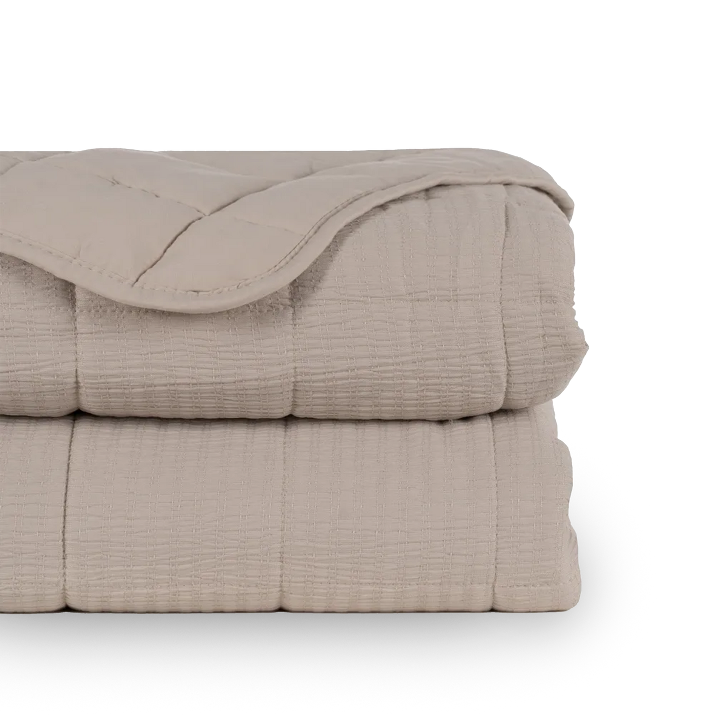 Martina beige and grey polyester quilts neatly folded in a bedroom setting