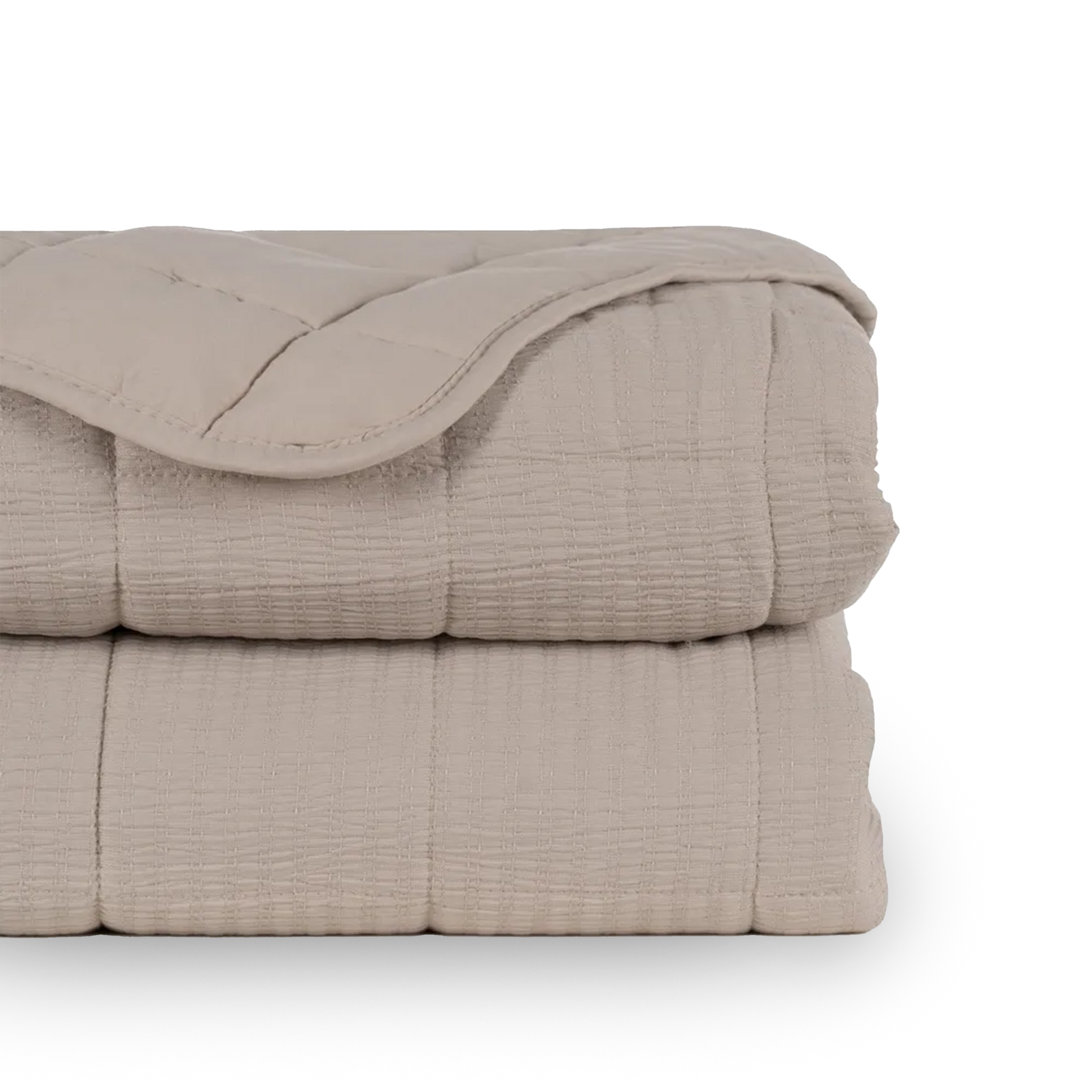 Martina beige and grey polyester quilts neatly folded in a bedroom setting
