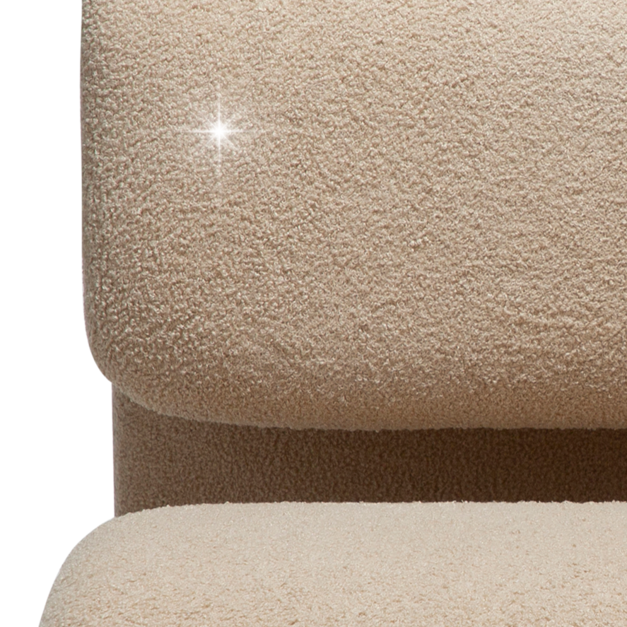 GLIMMER sculptural lounge chair with shimmering fabric and curved design from AK Interior Living