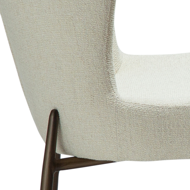 ELSA dining chair in bone white bouclé with curved back and antique brass legs by AK Interior Living