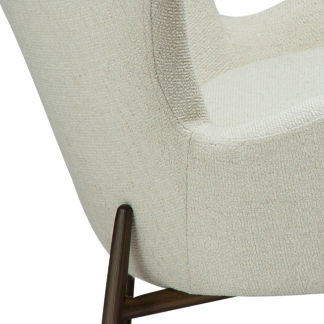 CARL bone white bouclé lounge chair with sculpted backrest and antique brass legs from AK Interior Living