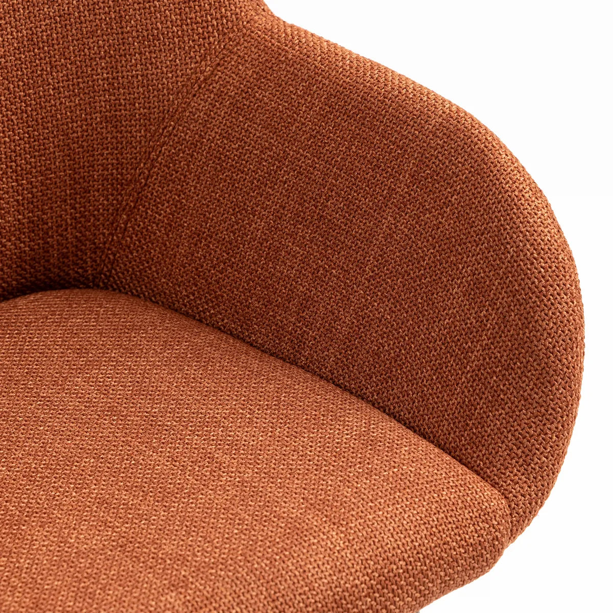 Angled view of ROMA fabric dining chair with dark oak wooden legs and curved armrest design