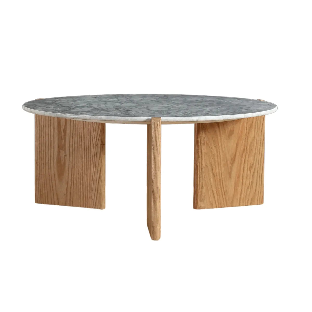 Riley coffee table with white marble top and oak veneer legs in a modern living room setting