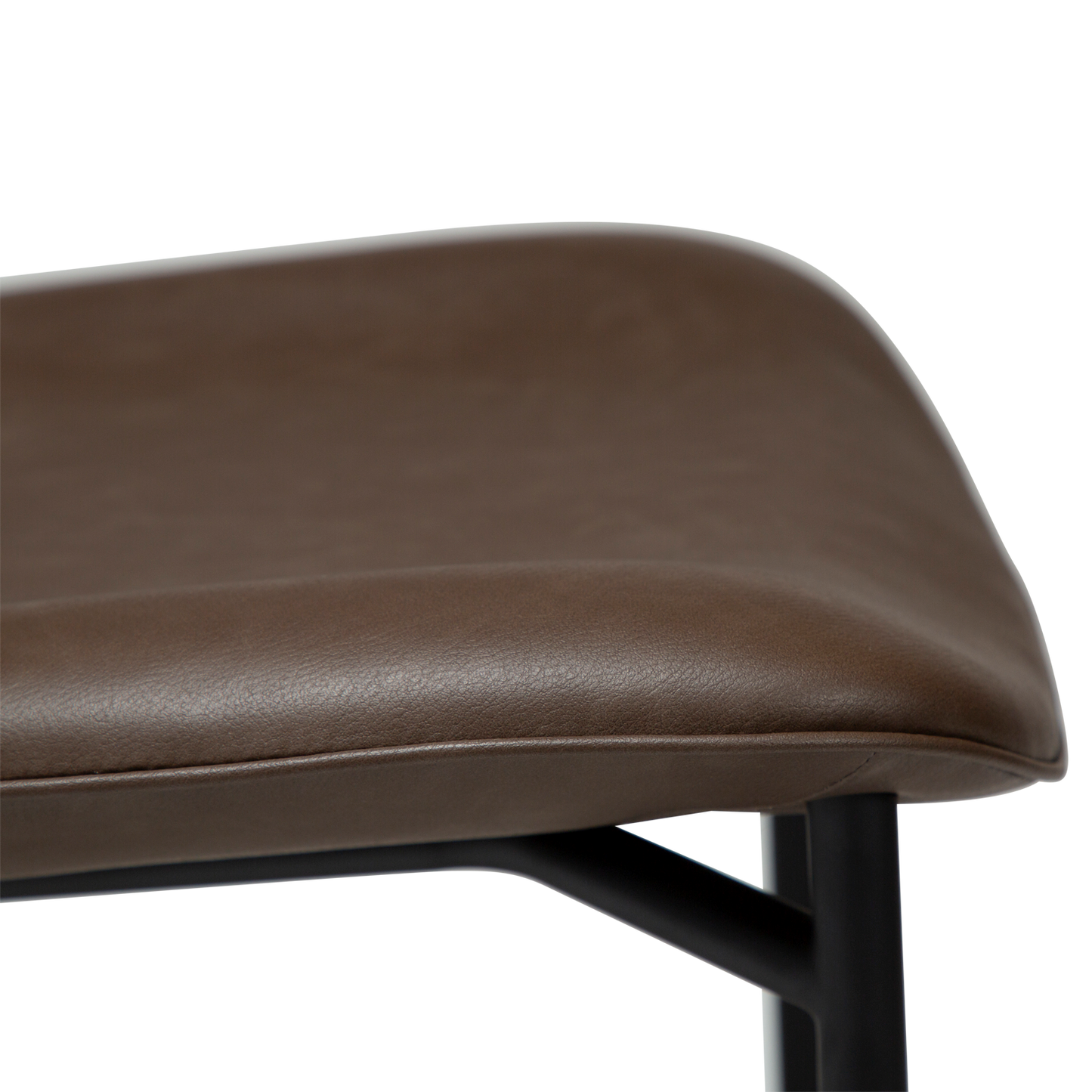 UMA leather dining chair with curved seat and black legs from AK Interior Living