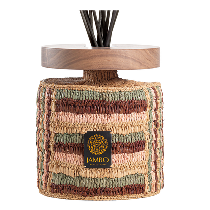 Isalo Raffia Diffuser – handcrafted raffia decor with cinnamon, clove, and amber fragrance notes from Jambo Exclusivo.