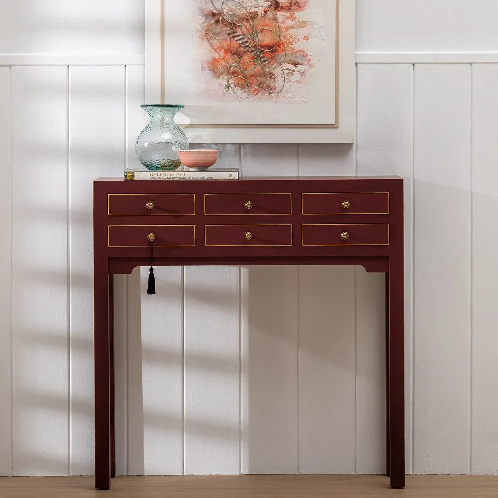 Aina red wooden console with 6 drawers and gold accent lines
