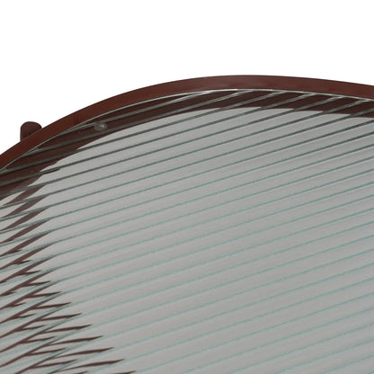 Alejandro tile-colored metal coffee table with ribbed glass top in a contemporary setting