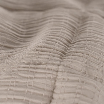 Martina beige and grey polyester quilts neatly folded in a bedroom setting
