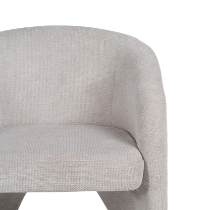 SORC modern curved armchair with fully upholstered frame and integrated legs