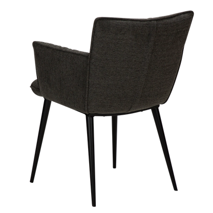 DWAYNE Armchair in crow black fabric with black metal legs, perfect for a modern interior setting