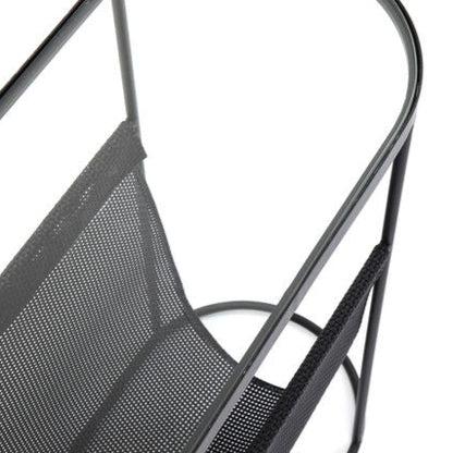 REY Journal Side Table with tempered glass top and black metal mesh pocket for storage.