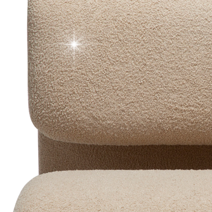 GLIMMER sculptural lounge chair with shimmering fabric and curved design from AK Interior Living