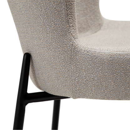 DINA dining chair in cashmere boucle with sculpted backrest and black legs by AK Interior Living

