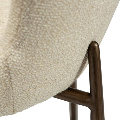 BROOKE dining chair in frosted almond bouclé with shimmer and antique brass legs by AK Interior Living

