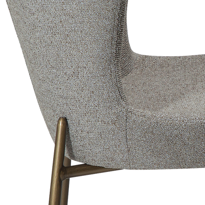 TARA dining chair in pebble earth bouclé with curved back and antique brass legs by AK Interior Living