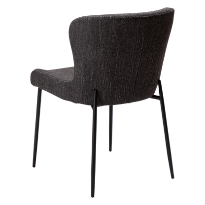MORGAN raven black bouclé dining chair with black extended legs and softly curved seat by AK Interior Living