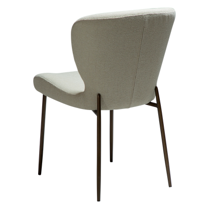 LELA bouclé dining chair with curved back and antique brass legs from AK Interior Living