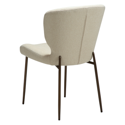 LELA bouclé dining chair with curved back and antique brass legs from AK Interior Living