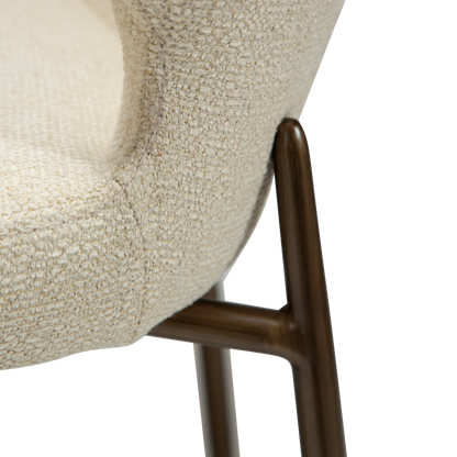 LELA bouclé dining chair with curved back and antique brass legs from AK Interior Living