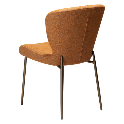 LELA bouclé dining chair with curved back and antique brass legs from AK Interior Living