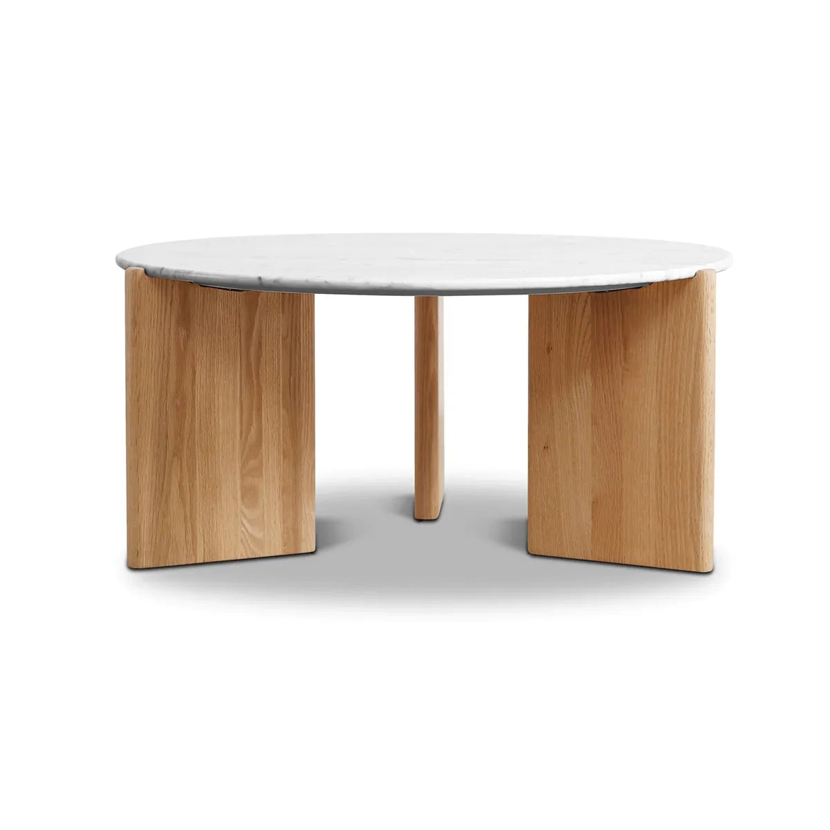 Riley coffee table with white marble top and oak veneer legs in a modern living room setting