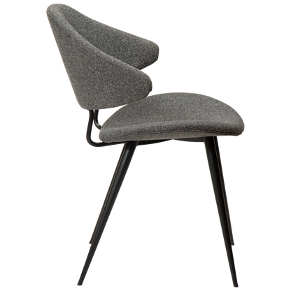 SELA boucle fabric dining chair with pointed backrest and black legs from AK Interior Living