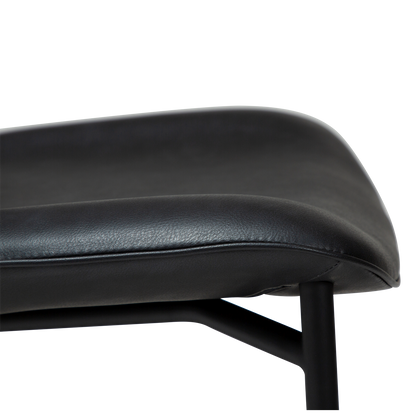 UMA leather dining chair with curved seat and black legs from AK Interior Living